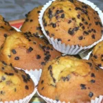 Peanut Butter Banana Muffins with chocolate chips on a plate