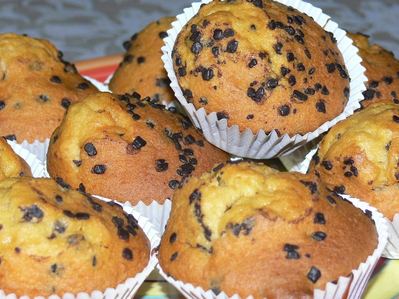 Peanut Butter Banana Muffins with chocolate chips on a plate
