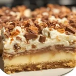Freshly baked cake mix toffee bars topped with chocolate and nuts.