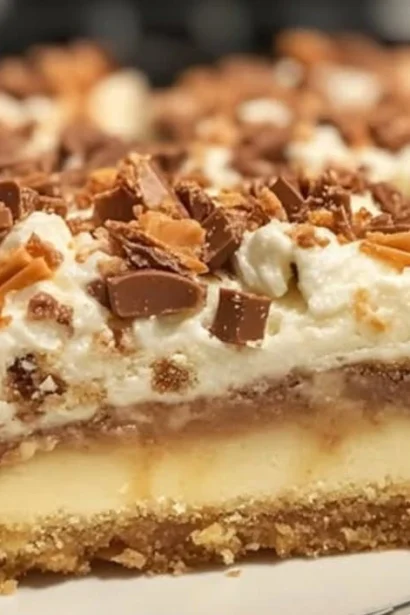 Freshly baked cake mix toffee bars topped with chocolate and nuts.