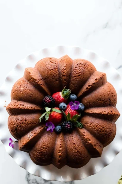 Delicious cream cheese pound cake on a white plate.