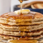 Delicious homemade Honey Oat Pancakes with whole wheat and oats