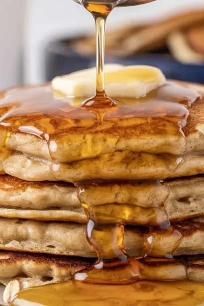 Delicious homemade Honey Oat Pancakes with whole wheat and oats