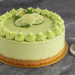 Delicious slice of Key Lime Cake with creamy frosting and key lime zest