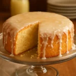 Pina Colada Pound Cake topped with pineapple slices and coconut sprinkles