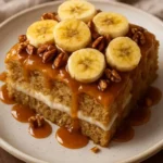 Delicious Southern banana cobbler served with whipped cream